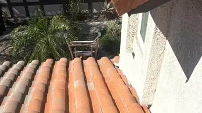 S Shaped Tile Lift & Relay Repair Photo